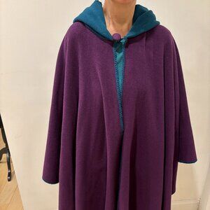 Reversible fleece cloak with button closure and hood
